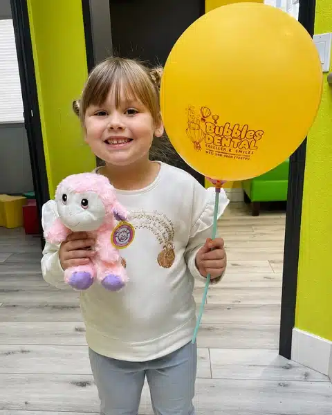 Happy child smiling at Bubbles Dental in Sacramento